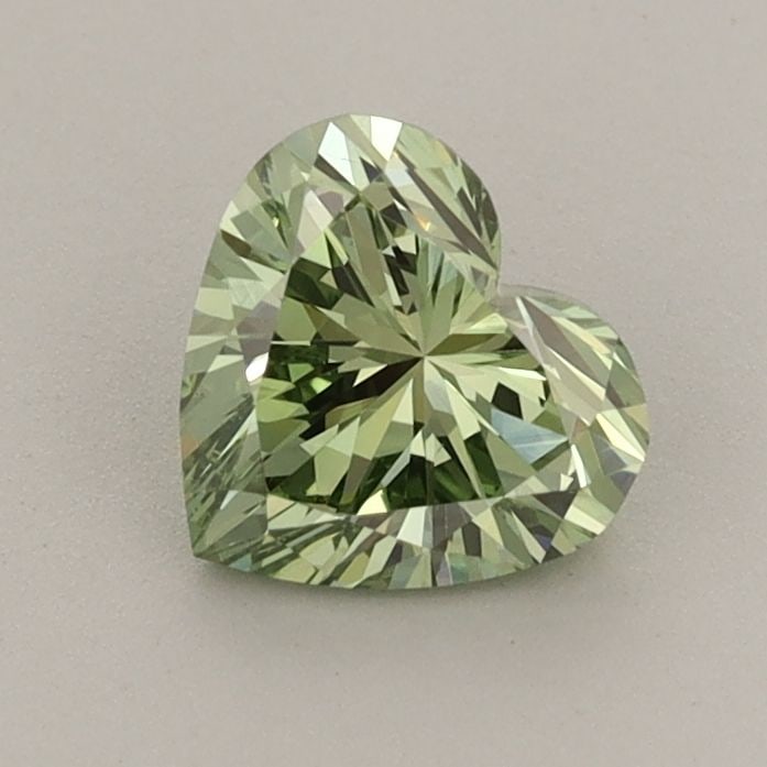Loose Diamond - HEART 0.8ct Fancy Vivid Green VS1: Loose Diamond - HEART 0.8ct Fancy Vivid Green VS1 Source: This is a real non-mined Diamond that has been grown in a lab Shape: HEART Carats: 0.8 Color: Fancy Vivid Green Certification: IGI Video: