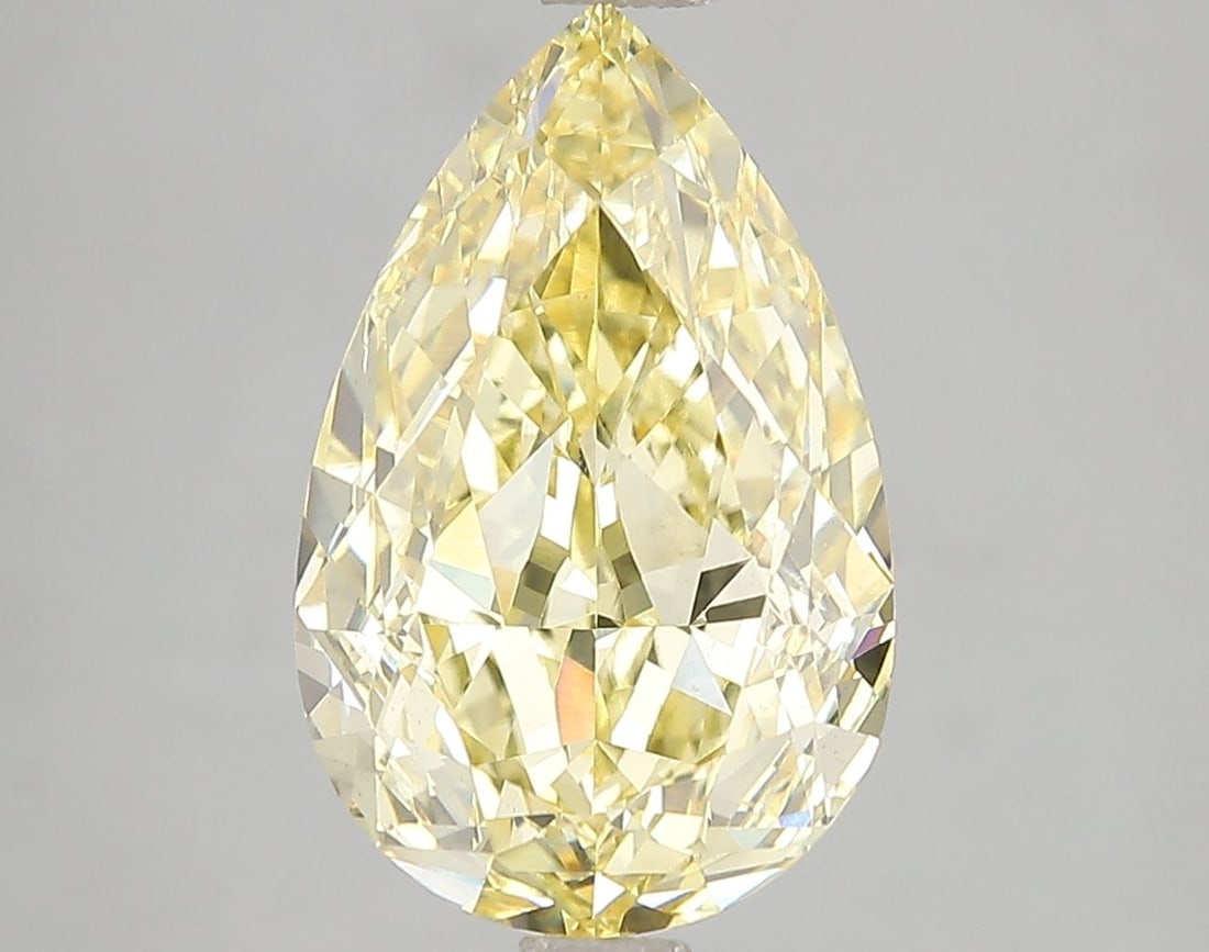 Loose Diamond - PEAR 5.1ct Fancy Vivid Yellow VS1: Loose Diamond - PEAR 5.1ct Fancy Vivid Yellow VS1 Source: This is a real non-mined Diamond that has been grown in a lab Shape: PEAR Carats: 5.1 Color: Fancy Vivid Yellow Certification: IGI Video: