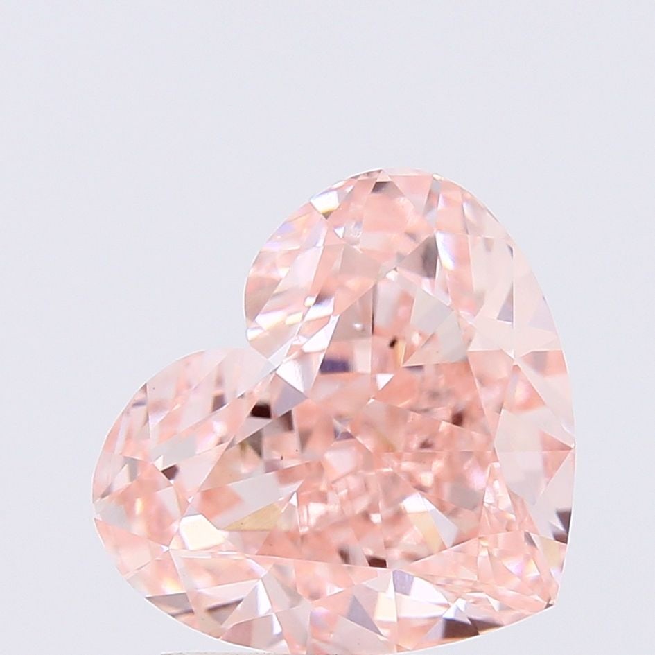 Loose Diamond - HEART 3.03ct Fancy Vivid Pink VS1: Loose Diamond - HEART 3.03ct Fancy Vivid Pink VS1 Source: This is a real non-mined Diamond that has been grown in a lab Shape: HEART Carats: 3.03 Color: Fancy Vivid Pink Certification: IGI Video: