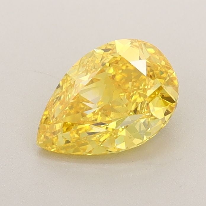 Loose Diamond - PEAR 0.87ct Fancy Vivid Yellow VS1: Loose Diamond - PEAR 0.87ct Fancy Vivid Yellow VS1 Source: This is a real non-mined Diamond that has been grown in a lab Shape: PEAR Carats: 0.87 Color: Fancy Vivid Yellow Certification: IGI Video: