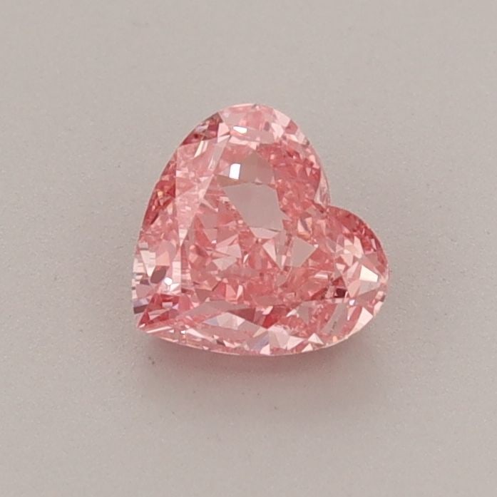 Loose Diamond - HEART 0.53ct Fancy Vivid Pink VS1: Loose Diamond - HEART 0.53ct Fancy Vivid Pink VS1 Source: This is a real non-mined Diamond that has been grown in a lab Shape: HEART Carats: 0.53 Color: Fancy Vivid Pink Certification: IGI Video: