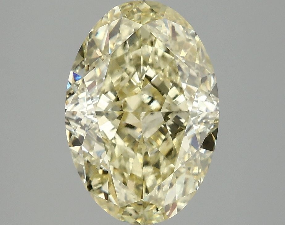 Loose Diamond - OVAL 3.08ct Fancy Intense Yellow VS1: Loose Diamond - OVAL 3.08ct Fancy Intense Yellow VS1 Source: This is a real non-mined Diamond that has been grown in a lab Shape: OVAL Carats: 3.08 Color: Fancy Intense Yellow Certification: IGI Video