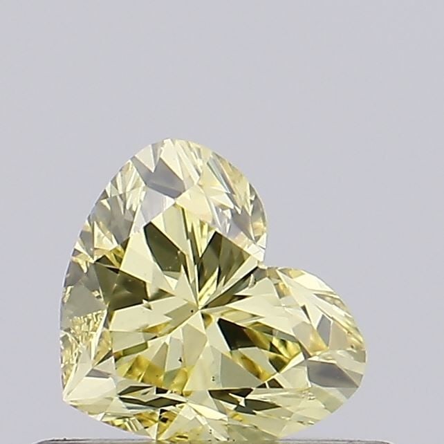 Loose Diamond - HEART 0.4ct Fancy Intense Yellow VS2: Loose Diamond - HEART 0.4ct Fancy Intense Yellow VS2 Source: This is a real non-mined Diamond that has been grown in a lab Shape: HEART Carats: 0.4 Color: Fancy Intense Yellow Certification: NONE Vide