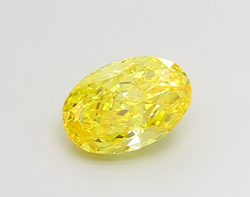 Loose Diamond - OVAL 1.52ct Fancy Vivid Yellow VVS2: Loose Diamond - OVAL 1.52ct Fancy Vivid Yellow VVS2 Source: This is a real non-mined Diamond that has been grown in a lab Shape: OVAL Carats: 1.52 Color: Fancy Vivid Yellow Certification: IGI Video: