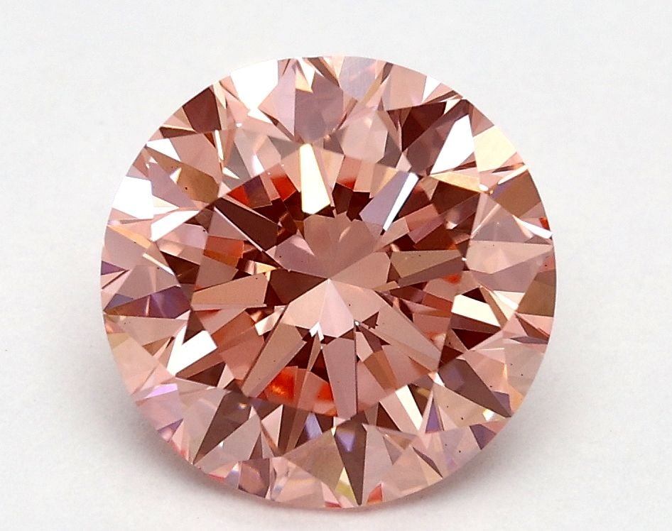 Loose Diamond - ROUND 1.8ct Fancy Vivid Pink VS1: Loose Diamond - ROUND 1.8ct Fancy Vivid Pink VS1 Source: This is a real non-mined Diamond that has been grown in a lab Shape: ROUND Carats: 1.8 Color: Fancy Vivid Pink Certification: IGI Video: