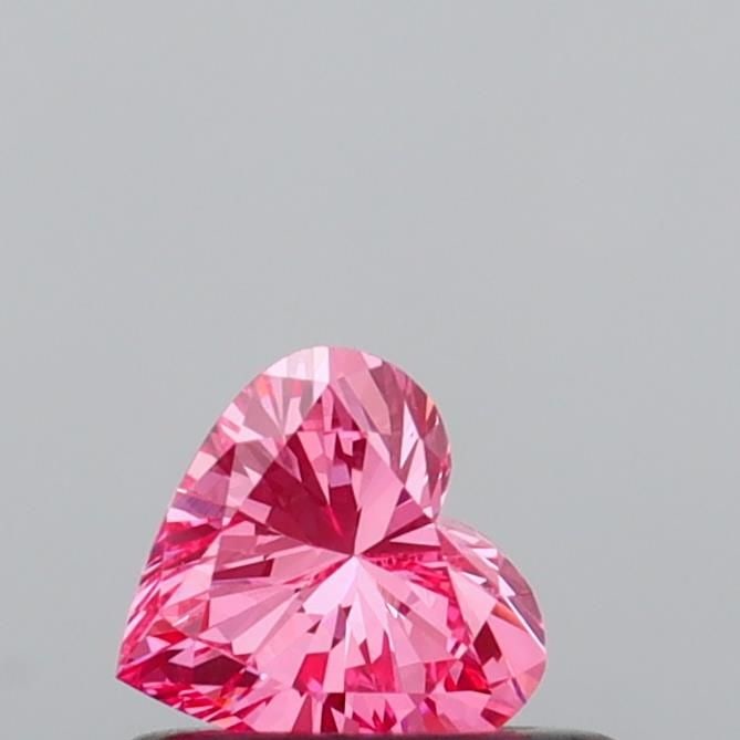 Loose Diamond - HEART 0.32ct Fancy Vivid Pink VS1: Loose Diamond - HEART 0.32ct Fancy Vivid Pink VS1 Source: This is a real non-mined Diamond that has been grown in a lab Shape: HEART Carats: 0.32 Color: Fancy Vivid Pink Certification: IGI Video: