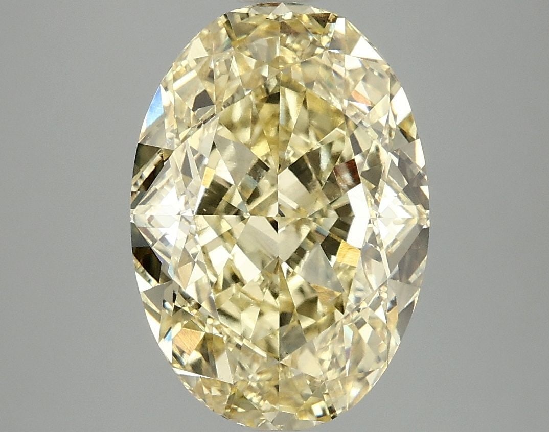 Loose Diamond - OVAL 5.1ct Fancy Vivid Yellow VS2: Loose Diamond - OVAL 5.1ct Fancy Vivid Yellow VS2 Source: This is a real non-mined Diamond that has been grown in a lab Shape: OVAL Carats: 5.1 Color: Fancy Vivid Yellow Certification: IGI Video: