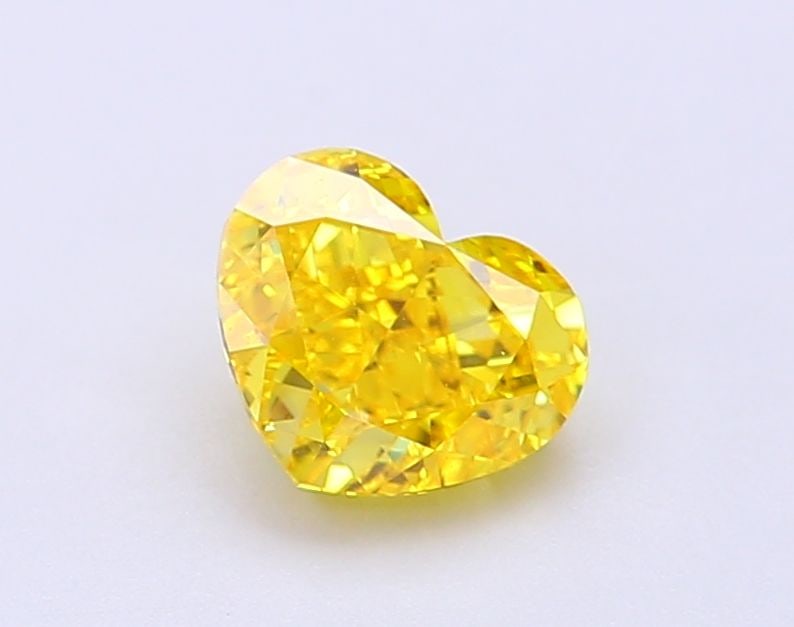 Loose Diamond - HEART 1.08ct Fancy Vivid Yellow VVS2: Loose Diamond - HEART 1.08ct Fancy Vivid Yellow VVS2 Source: This is a real non-mined Diamond that has been grown in a lab Shape: HEART Carats: 1.08 Color: Fancy Vivid Yellow Certification: IGI Video: