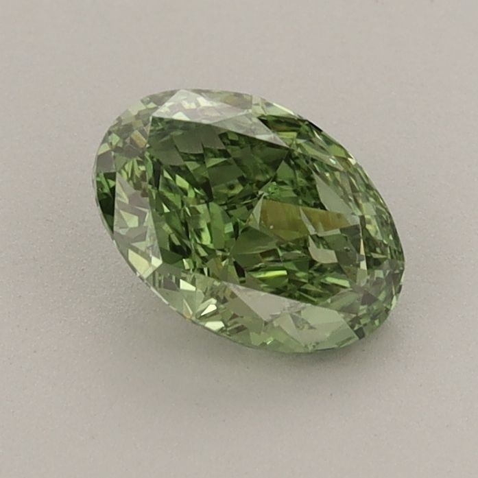 Loose Diamond - OVAL 0.75ct Fancy Vivid Green VS1: Loose Diamond - OVAL 0.75ct Fancy Vivid Green VS1 Source: This is a real non-mined Diamond that has been grown in a lab Shape: OVAL Carats: 0.75 Color: Fancy Vivid Green Certification: IGI Video: