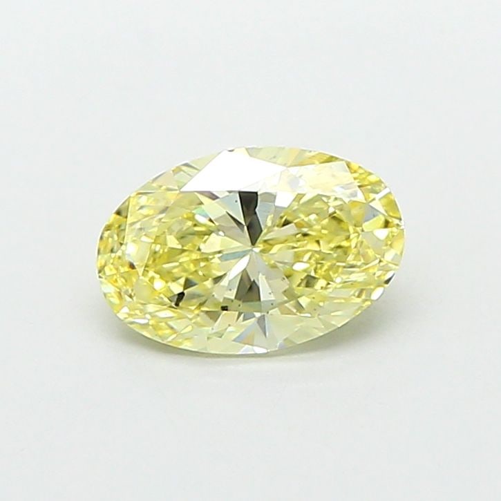 Loose Diamond - OVAL 0.8ct Fancy Yellow SI1: Loose Diamond - OVAL 0.8ct Fancy Yellow SI1 Source: This is a real non-mined Diamond that has been grown in a lab Shape: OVAL Carats: 0.8 Color: Fancy Yellow Certification: IGI Video: