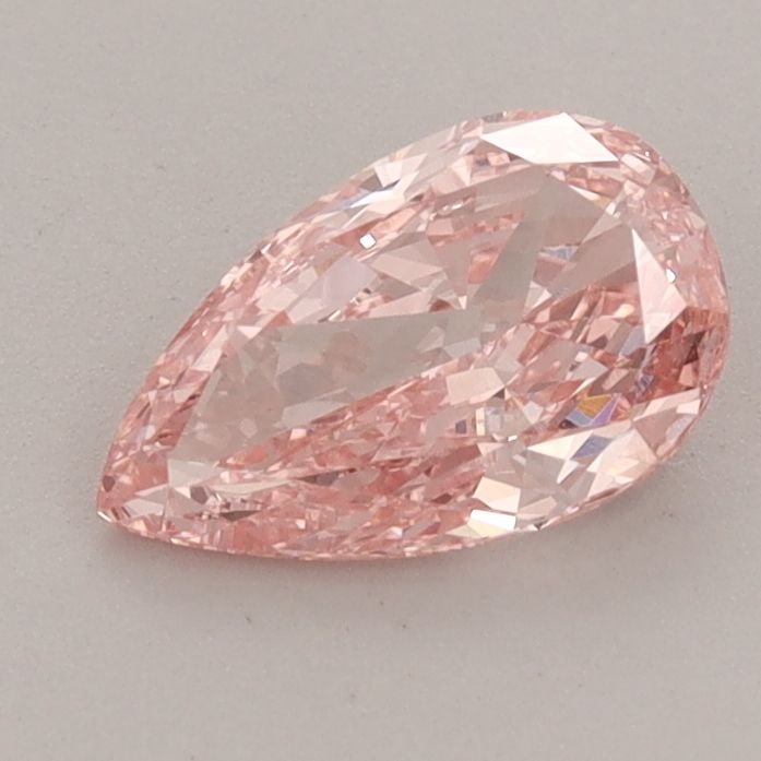 Loose Diamond - PEAR 0.82ct Fancy Vivid Pink VVS2: Loose Diamond - PEAR 0.82ct Fancy Vivid Pink VVS2 Source: This is a real non-mined Diamond that has been grown in a lab Shape: PEAR Carats: 0.82 Color: Fancy Vivid Pink Certification: IGI Video: