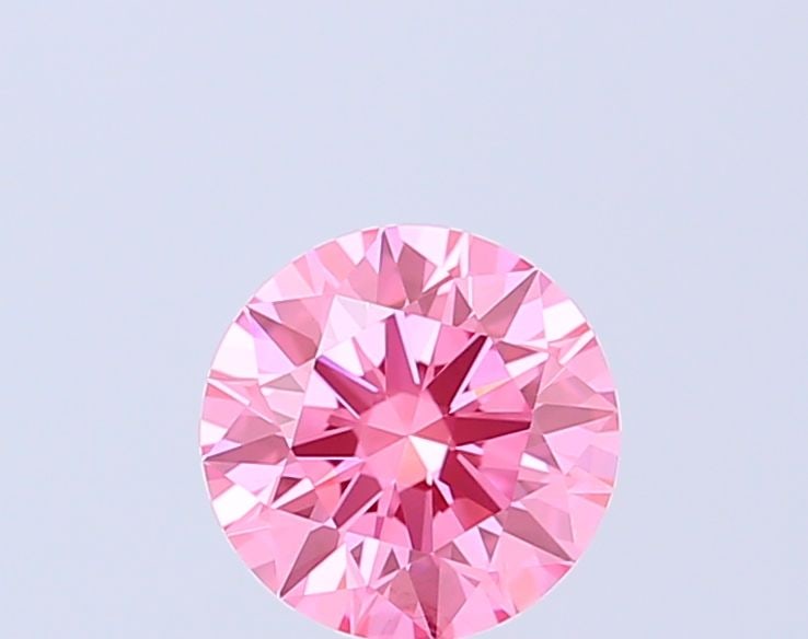 Ideal Loose Diamond - ROUND 1.1ct Fancy Vivid Pink VVS2: Ideal Loose Diamond - ROUND 1.1ct Fancy Vivid Pink VVS2 Source: This is a real non-mined Diamond that has been grown in a lab Shape: ROUND Carats: 1.1 Color: Fancy Vivid Pink Certification: IGI