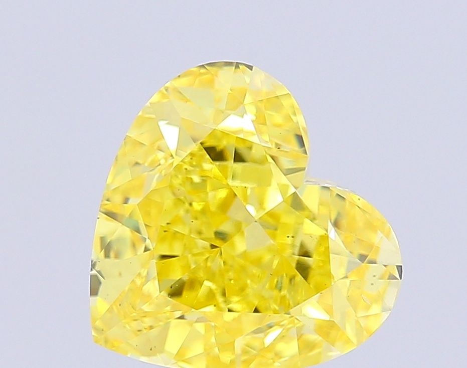 Loose Diamond - HEART 5.03ct Fancy Vivid Yellow VS2: Loose Diamond - HEART 5.03ct Fancy Vivid Yellow VS2 Source: This is a real non-mined Diamond that has been grown in a lab Shape: HEART Carats: 5.03 Color: Fancy Vivid Yellow Certification: IGI Video: