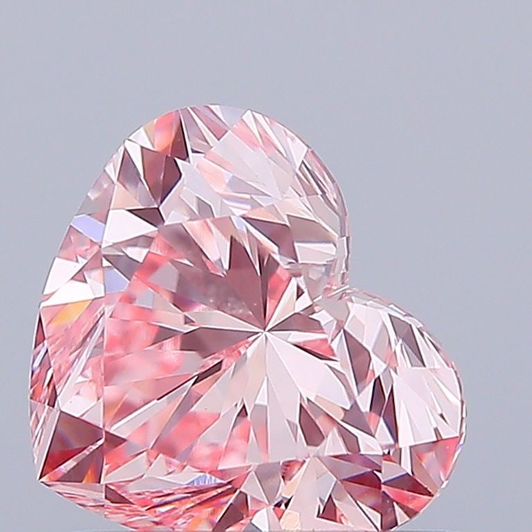 Loose Diamond - HEART 1.01ct Fancy Intense Pink VVS2: Loose Diamond - HEART 1.01ct Fancy Intense Pink VVS2 Source: This is a real non-mined Diamond that has been grown in a lab Shape: HEART Carats: 1.01 Color: Fancy Intense Pink Certification: IGI Video: