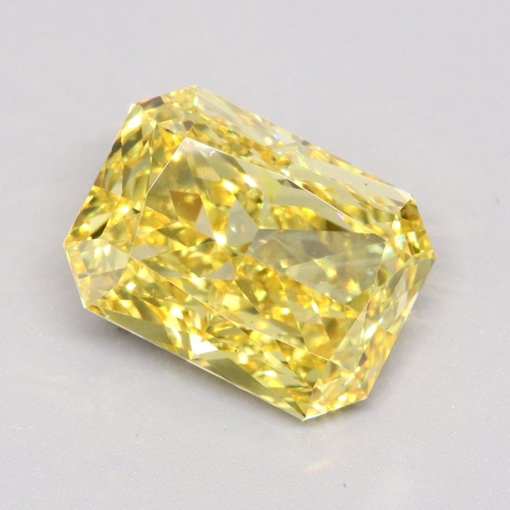 Loose Diamond - RADIANT 5.81ct Fancy Vivid Yellow VS2: Loose Diamond - RADIANT 5.81ct Fancy Vivid Yellow VS2 Source: This is a real non-mined Diamond that has been grown in a lab Shape: RADIANT Carats: 5.81 Color: Fancy Vivid Yellow Certification: IGI Vid