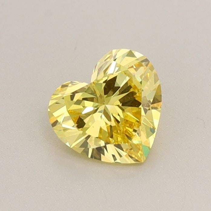 Loose Diamond - HEART 0.51ct Fancy Vivid Yellow VS1: Loose Diamond - HEART 0.51ct Fancy Vivid Yellow VS1 Source: This is a real non-mined Diamond that has been grown in a lab Shape: HEART Carats: 0.51 Color: Fancy Vivid Yellow Certification: IGI Video: