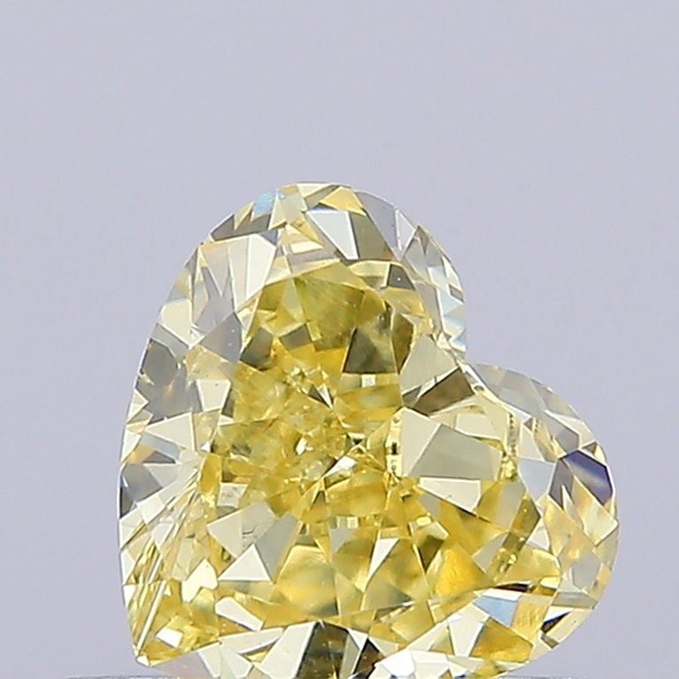Loose Diamond - HEART 0.57ct Fancy Intense Yellow VS2: Loose Diamond - HEART 0.57ct Fancy Intense Yellow VS2 Source: This is a real non-mined Diamond that has been grown in a lab Shape: HEART Carats: 0.57 Color: Fancy Intense Yellow Certification: IGI Vid