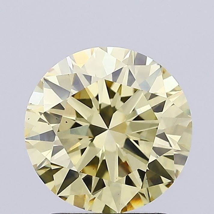 Loose Diamond - ROUND 2.1ct Fancy Yellow VS1: Loose Diamond - ROUND 2.1ct Fancy Yellow VS1 Source: This is a real non-mined Diamond that has been grown in a lab Shape: ROUND Carats: 2.1 Color: Fancy Yellow Certification: IGI Video: