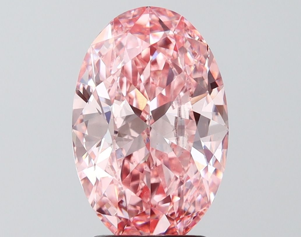 Loose Diamond - OVAL 3.06ct Fancy Vivid Pink VS2: Loose Diamond - OVAL 3.06ct Fancy Vivid Pink VS2 Source: This is a real non-mined Diamond that has been grown in a lab Shape: OVAL Carats: 3.06 Color: Fancy Vivid Pink Certification: IGI Video: Video