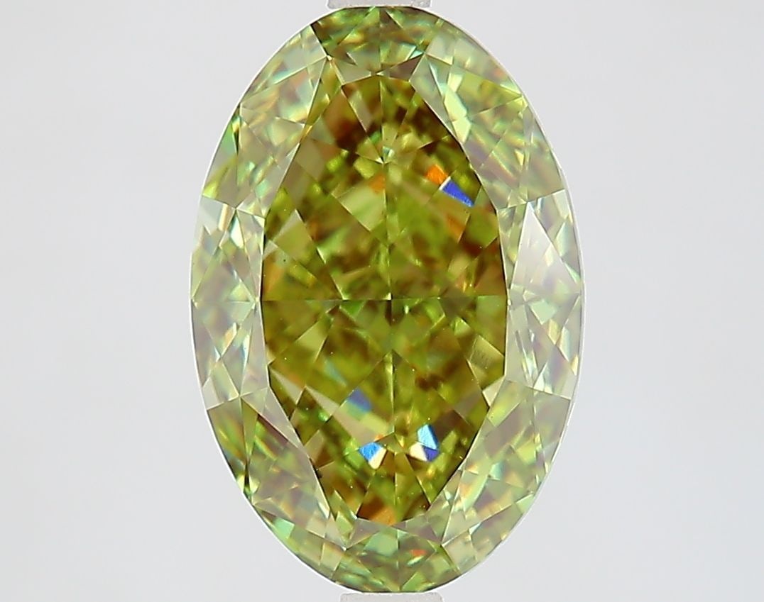Loose Diamond - OVAL 4.05ct Fancy Vivid Green VVS2: Loose Diamond - OVAL 4.05ct Fancy Vivid Green VVS2 Source: This is a real non-mined Diamond that has been grown in a lab Shape: OVAL Carats: 4.05 Color: Fancy Vivid Green Certification: IGI Video: