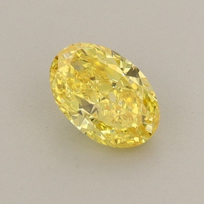 Loose Diamond - OVAL 0.51ct Fancy Vivid Yellow VS1: Loose Diamond - OVAL 0.51ct Fancy Vivid Yellow VS1 Source: This is a real non-mined Diamond that has been grown in a lab Shape: OVAL Carats: 0.51 Color: Fancy Vivid Yellow Certification: IGI Video: