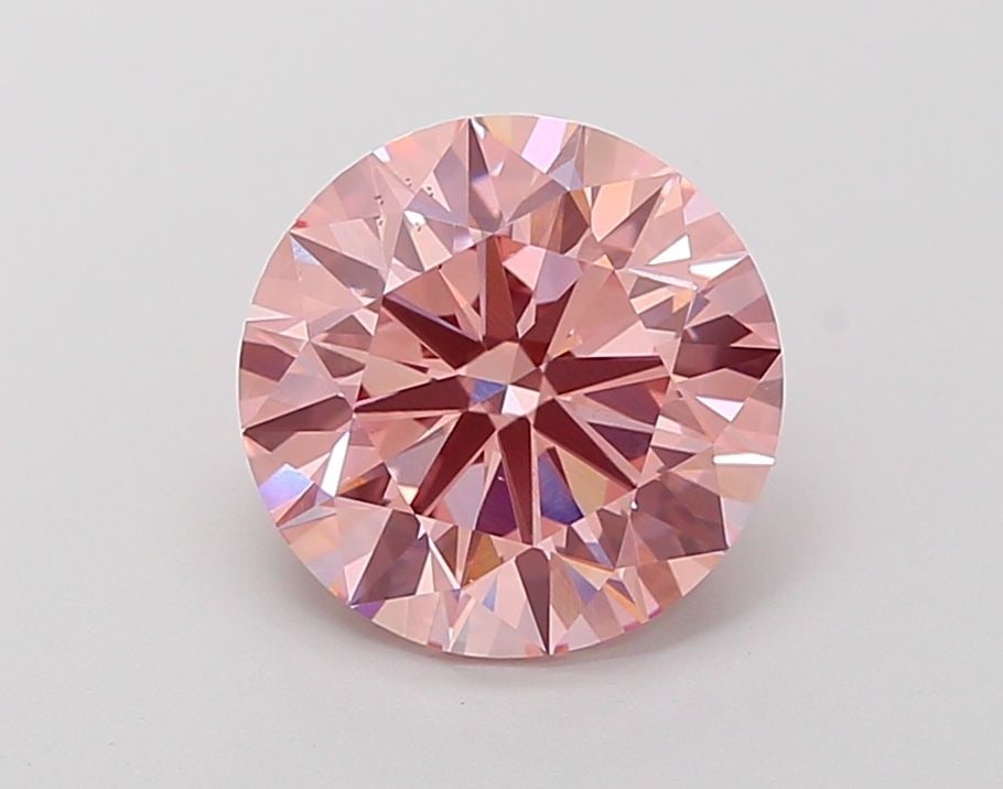 Ideal Loose Diamond - ROUND 3.0ct Fancy Vivid Pink VS2: Ideal Loose Diamond - ROUND 3.0ct Fancy Vivid Pink VS2 Source: This is a real non-mined Diamond that has been grown in a lab Shape: ROUND Carats: 3.0 Color: Fancy Vivid Pink Certification: IGI Video: