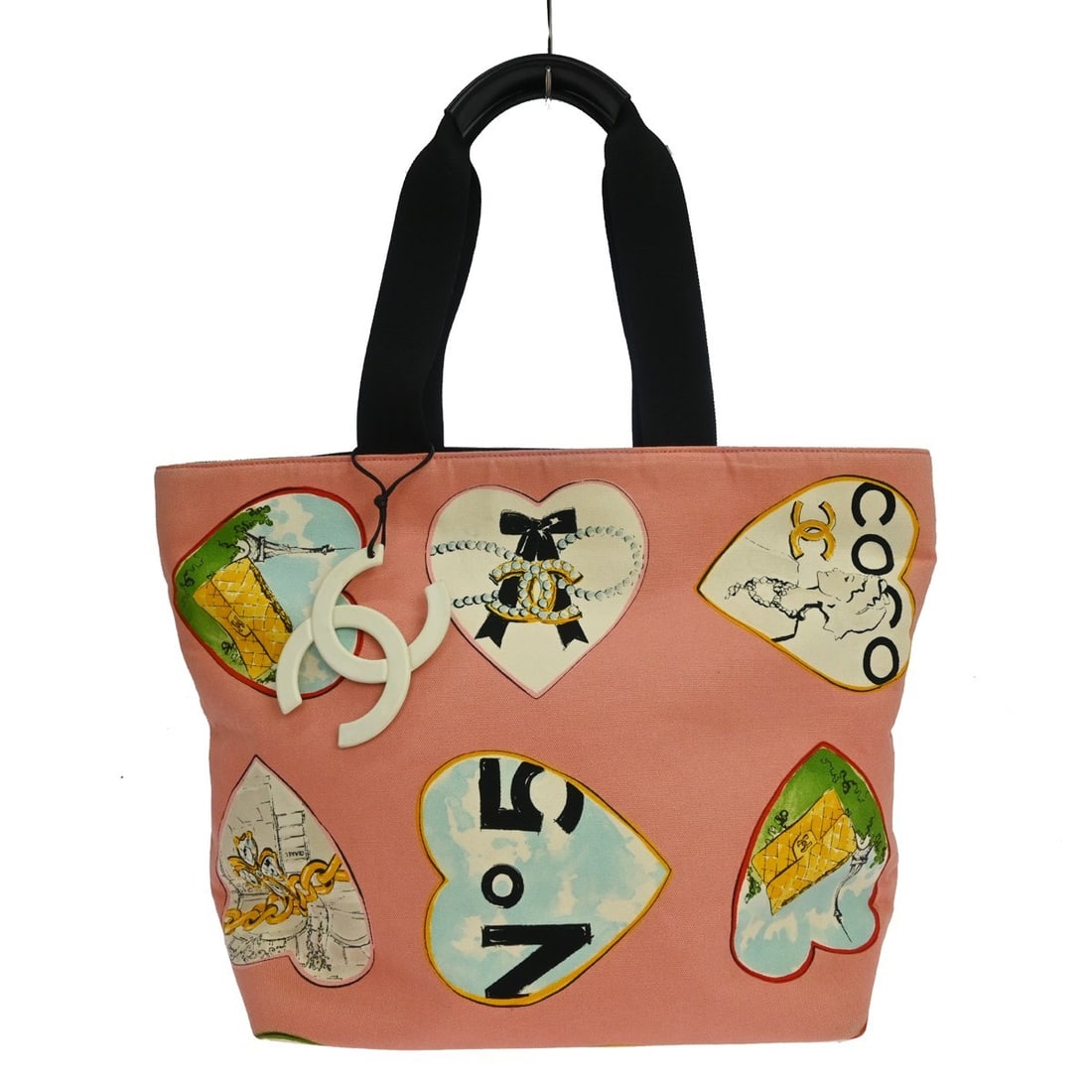 CHANEL Valentines Heart Pink Canvas Medium Tote Bag: CHANEL Valentines Heart Pink Canvas Medium Tote Bag Vintage Chanel tote bag in pink canvas with black double handles and a zip closure. The bag features a white canvas lining and two interior zipper p