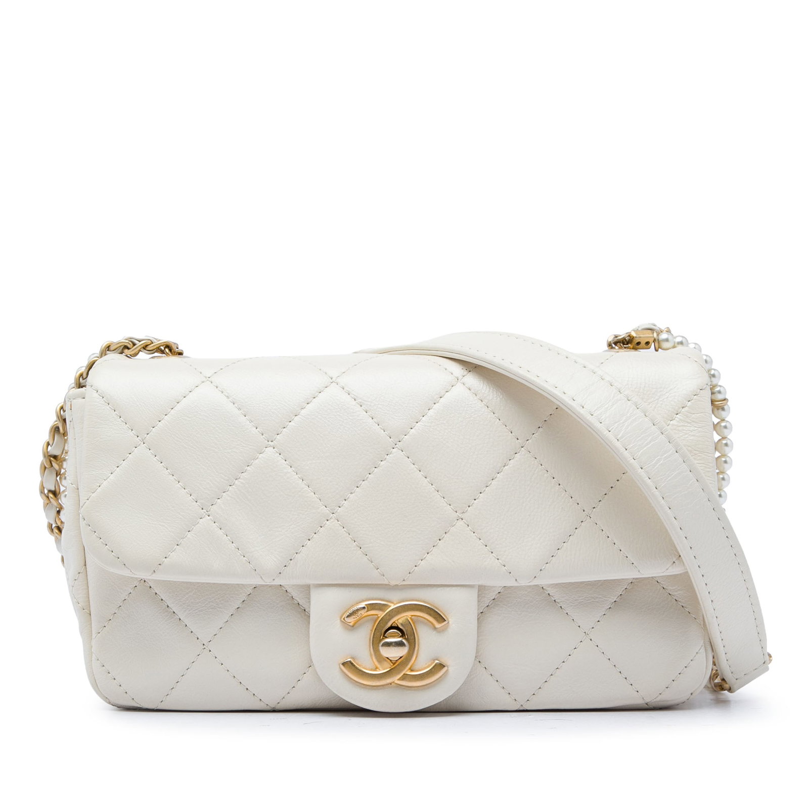 Chanel Mini Crossbody Bag White Quilted Calfskin Pearl Chain: Chanel Mini Crossbody Bag White Quilted Calfskin Pearl Chain A Chanel mini crossbody bag crafted with a quilted calfskin leather body and a leather-woven chain strap accented with crystal pearls and a