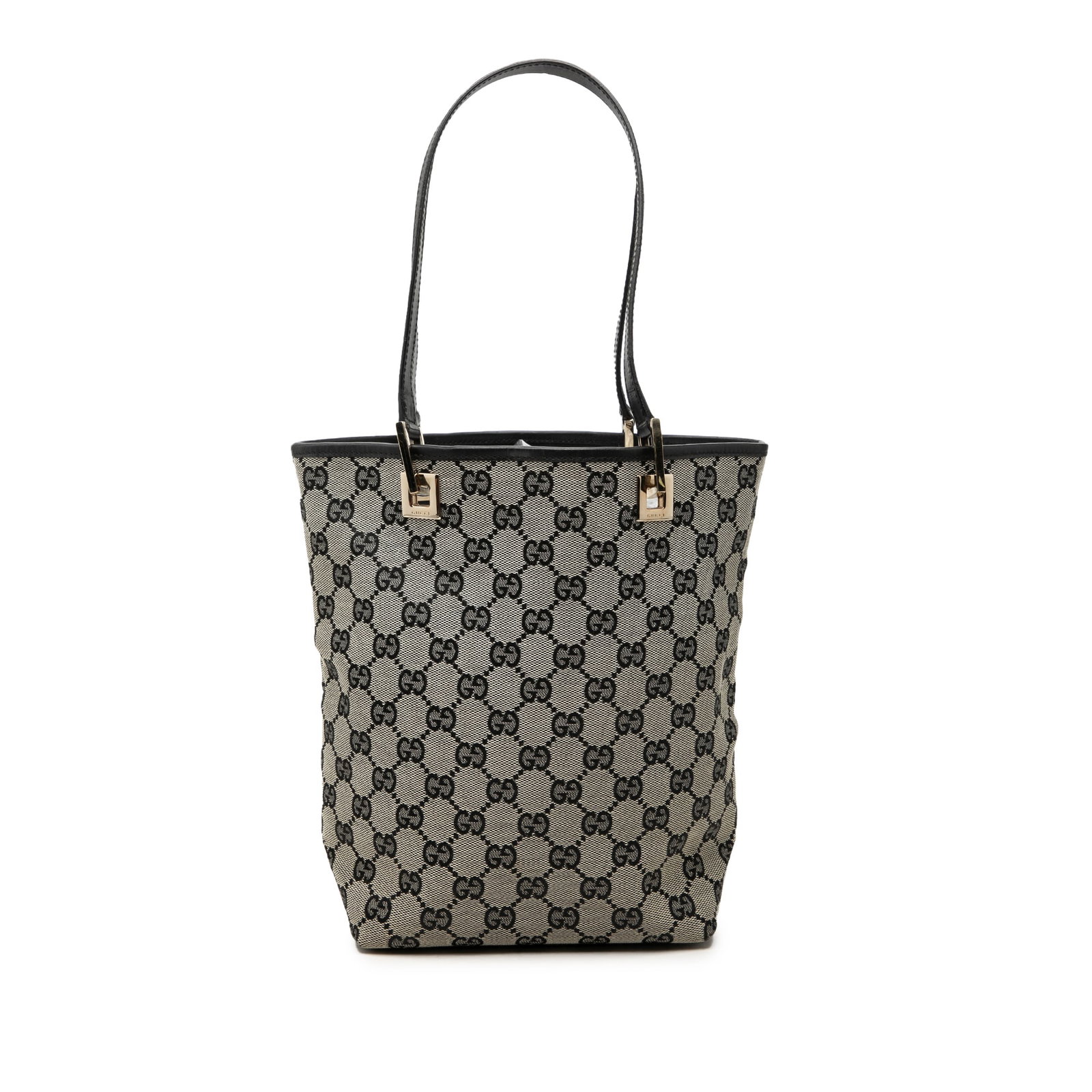Gucci GG Canvas Tote Bag Beige Fabric Leather Trim: Gucci GG Canvas Tote Bag Beige Fabric Leather Trim Gucci GG Canvas Tote in beige with a canvas body, leather trim, and flat leather straps. The open-top design includes an interior zip pocket for adde