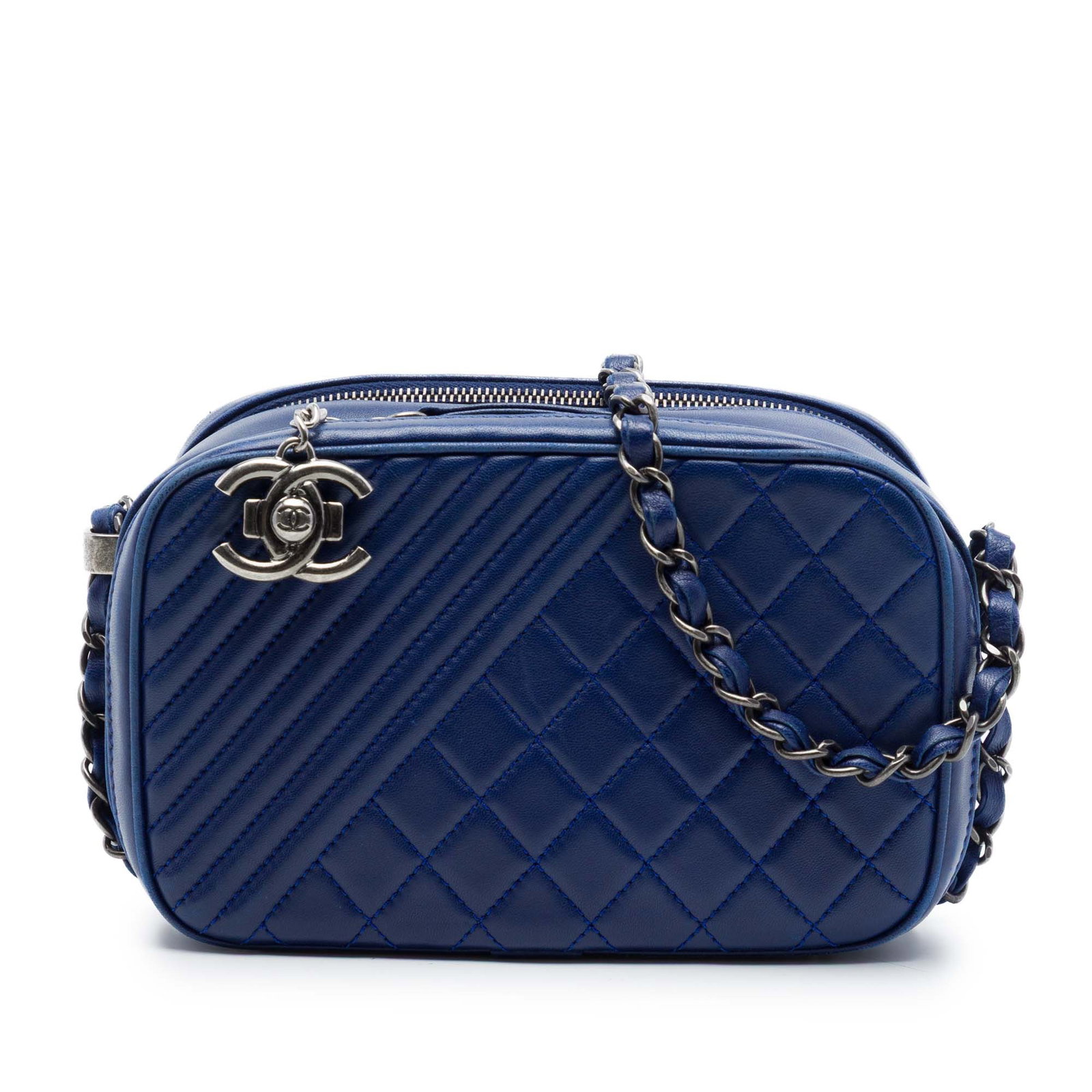 Chanel Coco Boy Small Camera Bag Blue Quilted Lambskin: Chanel Coco Boy Small Camera Bag Blue Quilted Lambskin A compact Chanel Coco Boy Camera Bag crafted in blue quilted lambskin leather. This shoulder bag features a leather-woven chain link strap with a