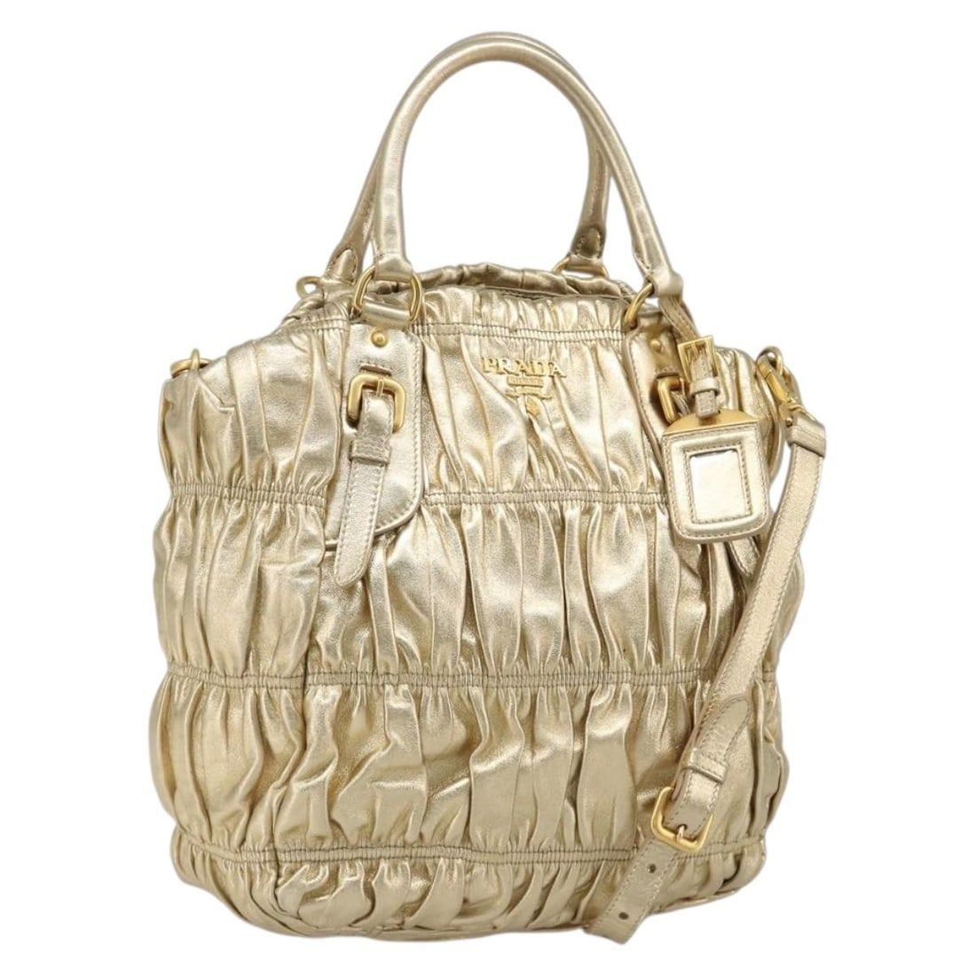 PRADA Leather 2way Hand Bag Gold Tone with Shoulder Strap: PRADA Leather 2way Hand Bag Gold Tone with Shoulder Strap Prada women's 2-way handbag in leather with a gold tone/gold exterior. Made in Italy, this bag includes a dust bag and shoulder strap. Conditi