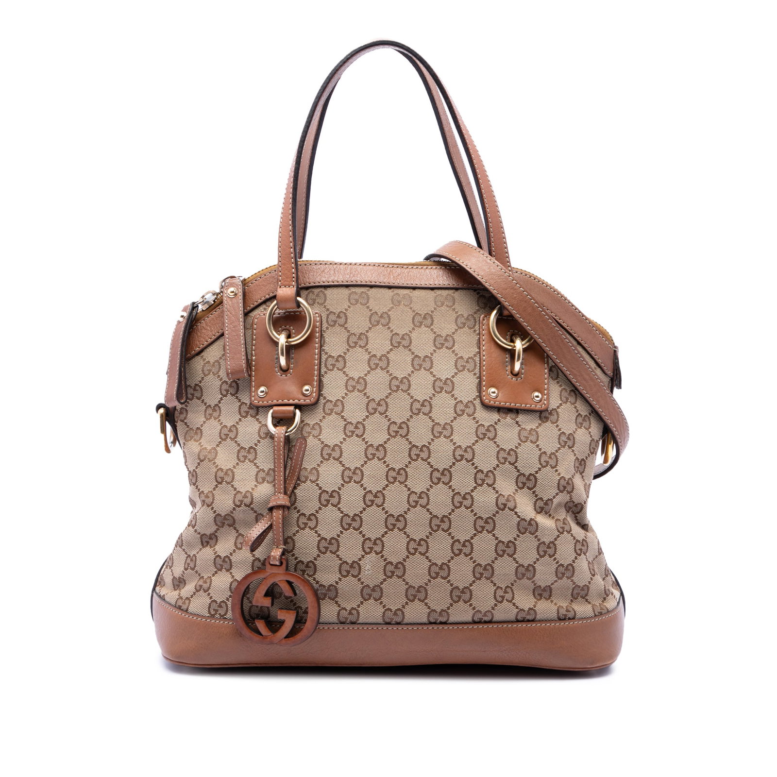 Gucci GG Canvas Dome Satchel Medium Beige Leather Trim: Gucci GG Canvas Dome Satchel Medium Beige Leather Trim Gucci Medium GG Canvas Charm Dome Satchel in beige canvas with leather trim. This satchel features flat leather handles, a detachable flat strap,