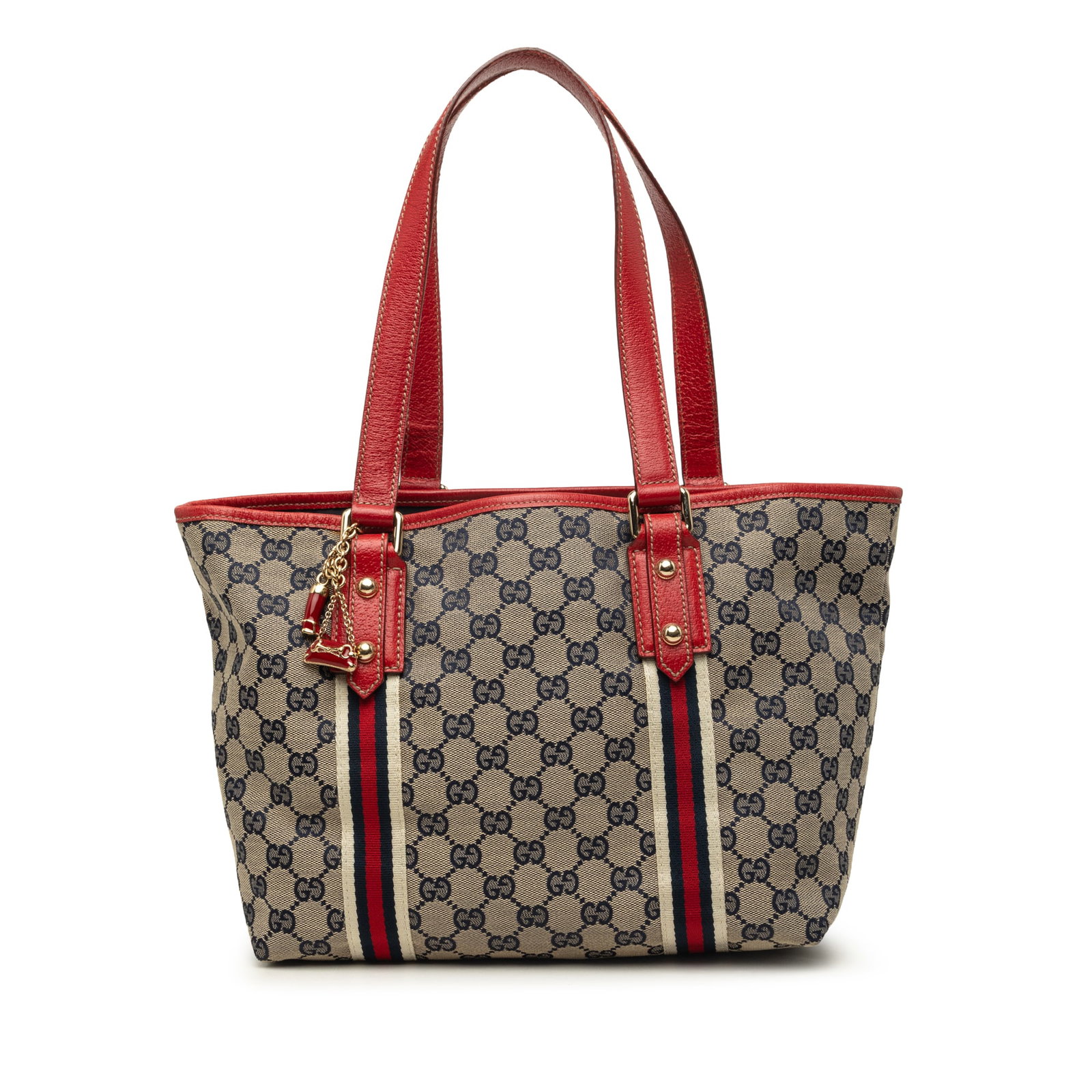 Gucci Jolicoeur Tote Brown GG Canvas Shoulder Bag: Gucci Jolicoeur Tote Brown GG Canvas Shoulder Bag Gucci GG Canvas Jolicoeur Tote in brown with a canvas body, flat leather straps, an open top, and interior zip and slip pockets. Includes dust bag. Co