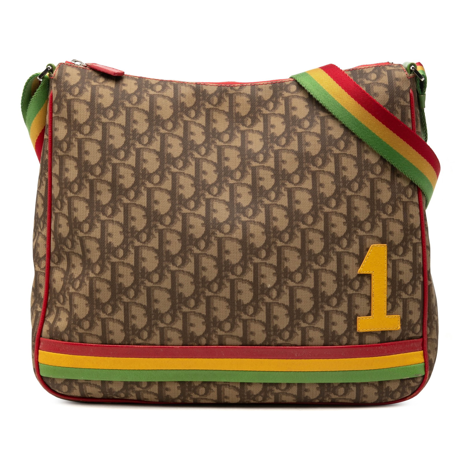 Dior Rasta Trotter Diorissimo Crossbody Bag Coated Canvas: Dior Rasta Trotter Diorissimo Crossbody Bag Coated Canvas This Dior crossbody bag features the Diorissimo Trotter Rasta design in coated canvas with leather trim. It has a flat shoulder strap, a top z