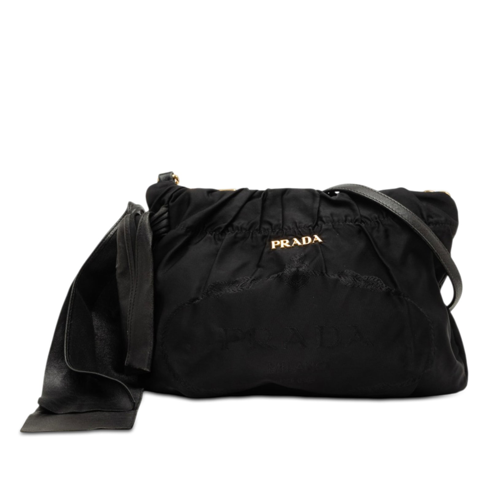 Prada Tessuto Canapa Bow Logo Nylon Crossbody Bag: Prada Tessuto Canapa Bow Logo Nylon Crossbody Bag Prada Tessuto Canapa Logo Bow Crossbody bag in black fabric with a bow detail, detachable and adjustable flat leather strap, and top zip closure. Made