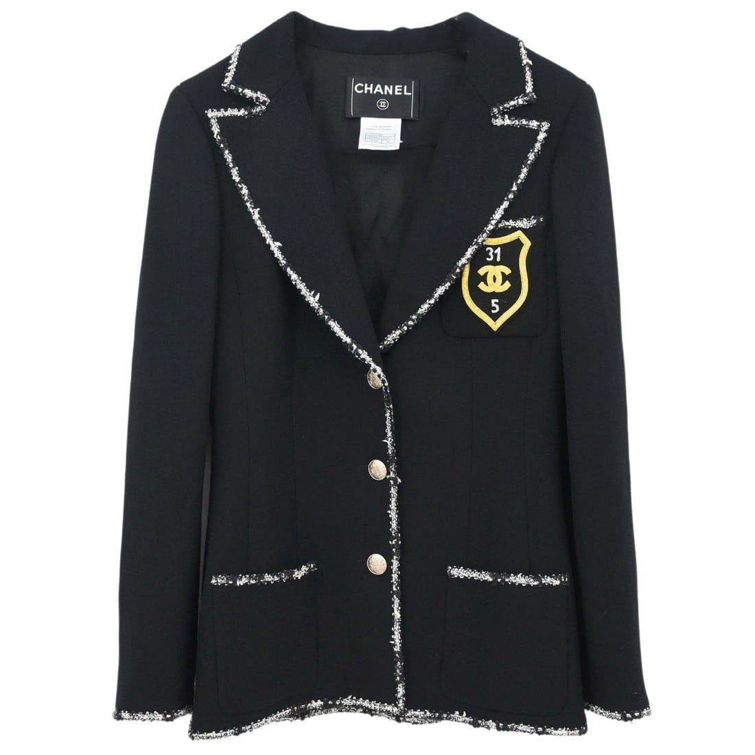 CHANEL Black Wool Mid Length Jacket Size 36 Logo Buttons: CHANEL Black Wool Mid Length Jacket Size 36 Logo Buttons Vintage Chanel single-breasted jacket in black wool with a collared design and emblem logo accents. This women's mid-length jacket features lon