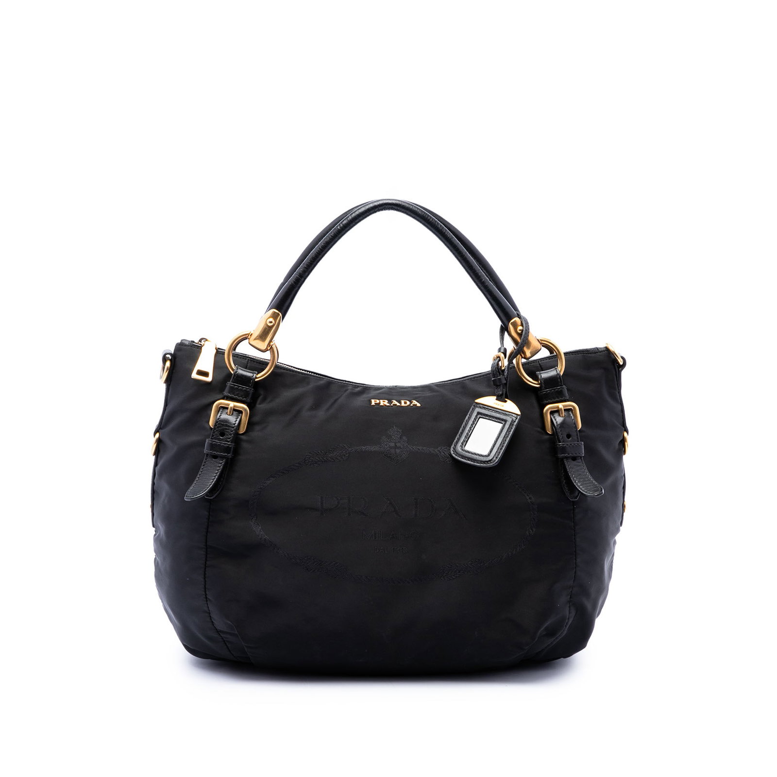 Prada Tessuto Canapa satchel in black nylon with leather trim: Prada Tessuto Canapa satchel in black nylon with leather trim Prada Tessuto Canapa Logo Satchel in black with a nylon body and leather trim. It features rolled leather handles, a top zip closure, and 