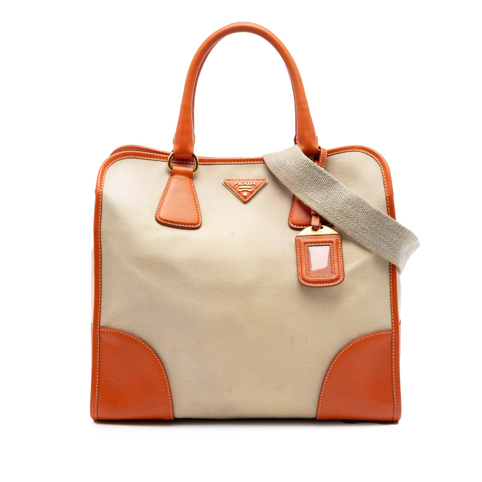 Prada Canapa Satchel in Beige Canvas with Saffiano Leather Trim: Prada Canapa Satchel in Beige Canvas with Saffiano Leather Trim Prada Canapa satchel in beige canvas with saffiano leather trim. This bag features rolled leather handles, a detachable flat strap, an o