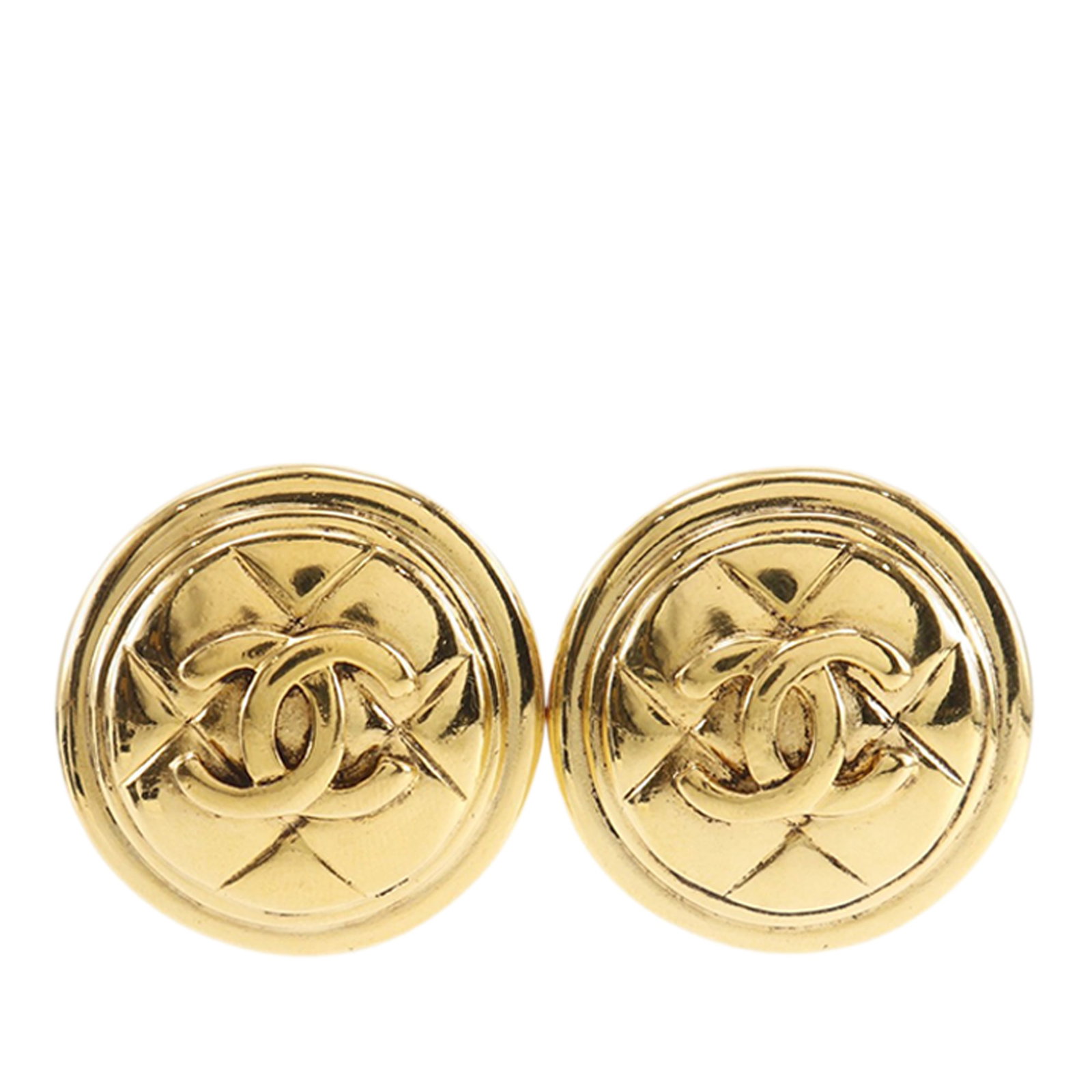 Chanel CC Round Clip On Earrings Gold Tone Quilted Metal: Chanel CC Round Clip On Earrings Gold Tone Quilted Metal Round clip-on earrings with Chanel CC quilted styling in gold tone metal. This costume jewelry pair is made in France and includes the box. Con