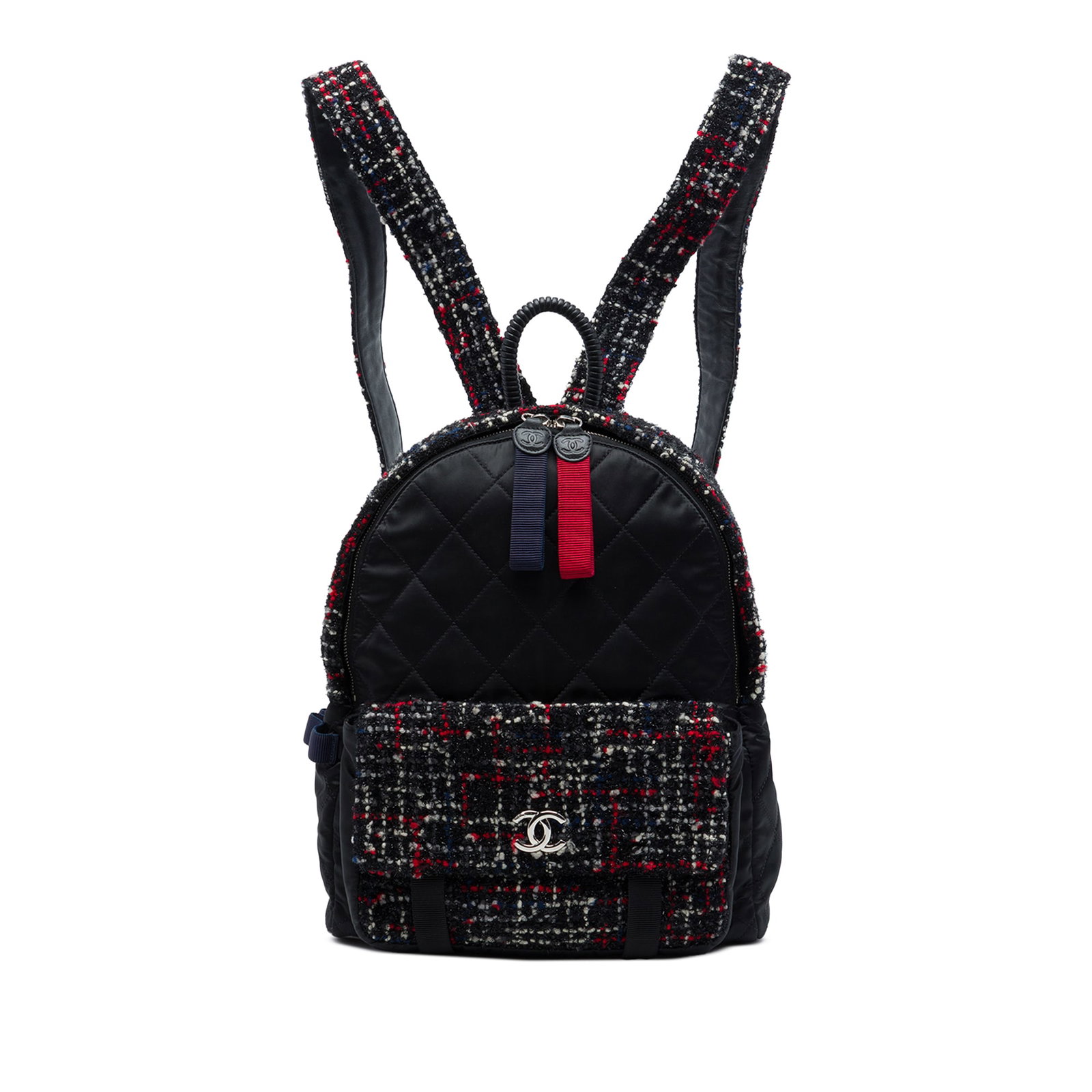 Chanel Astronaut Essentials Backpack Quilted Nylon Tweed Black: Chanel Astronaut Essentials Backpack Quilted Nylon Tweed Black A Chanel Astronaut Essentials backpack crafted in quilted nylon and tweed. This design features a rolled top handle, adjustable tweed fla
