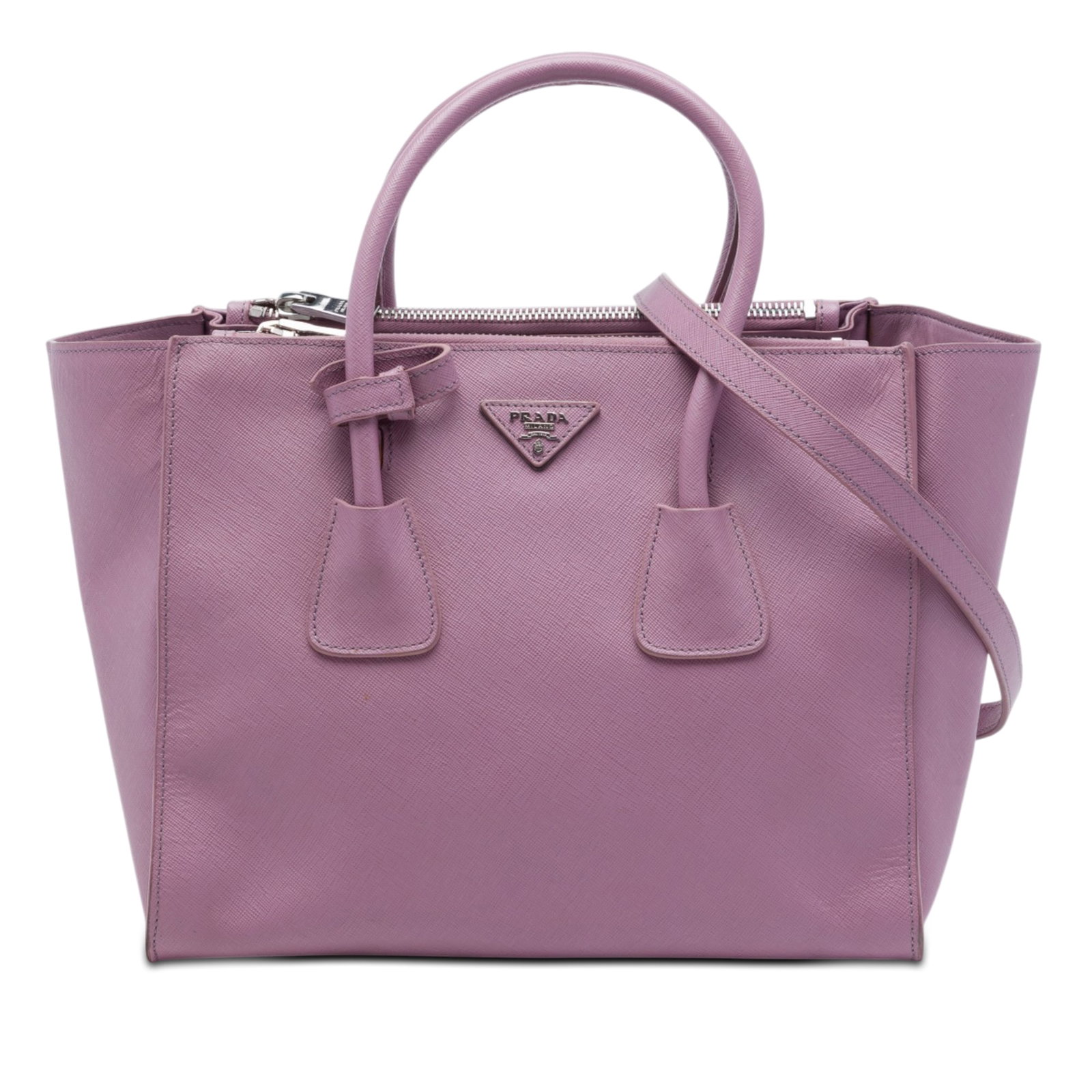 Prada Twin Pocket Medium Satchel in Purple Saffiano Leather: Prada Twin Pocket Medium Satchel in Purple Saffiano Leather This Prada Medium Saffiano Twin Pocket Satchel is crafted in purple saffiano leather with rolled leather handles and a detachable flat leath