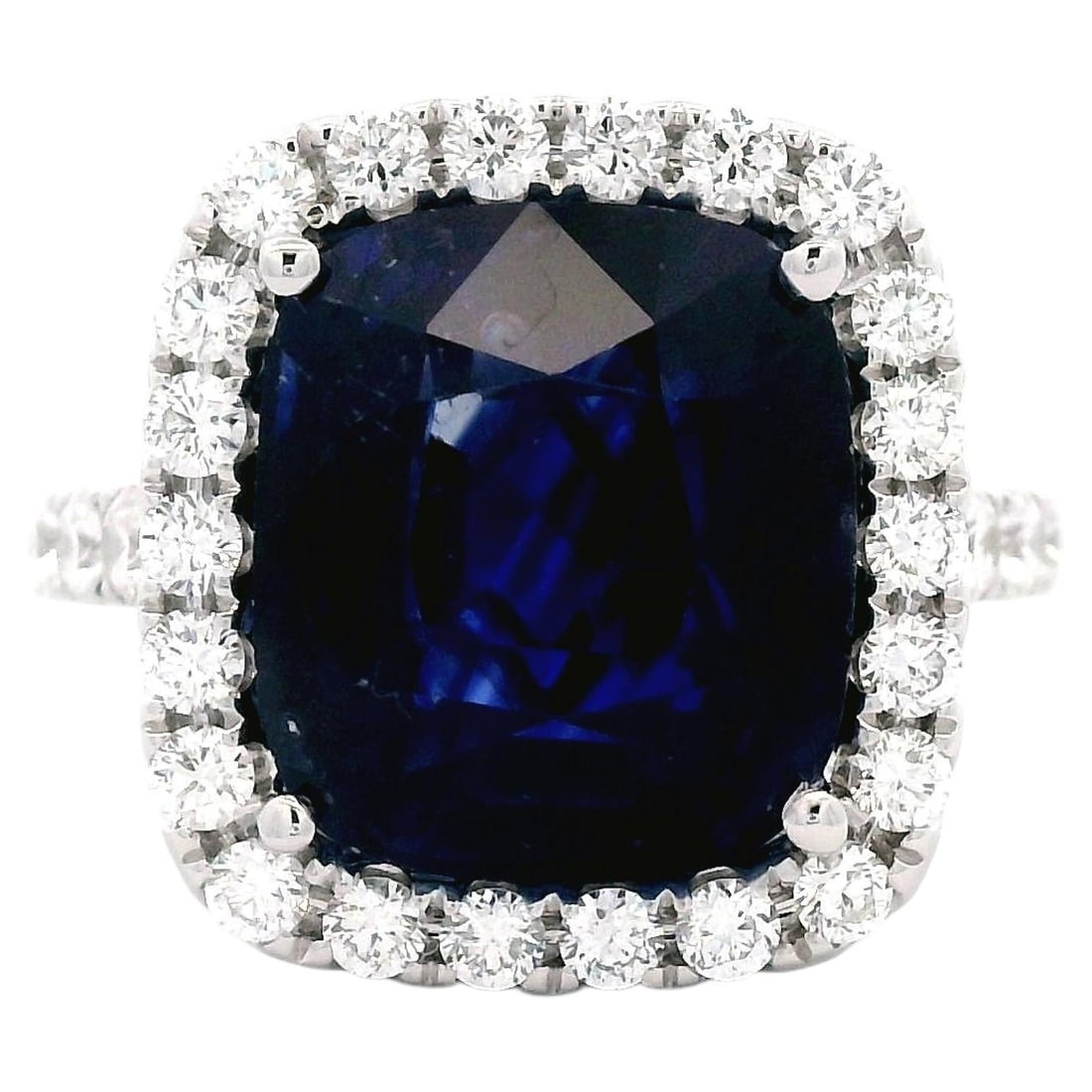 18k White Gold Ring Ceylon Sapphire Diamond GIA 8.16ct: 18k White Gold Ring Ceylon Sapphire Diamond GIA 8.16ct GIA-certified ring featuring an 8.16 ct cushion-cut Ceylon blue sapphire accented by a diamond halo. This contemporary 18k white gold ring contai