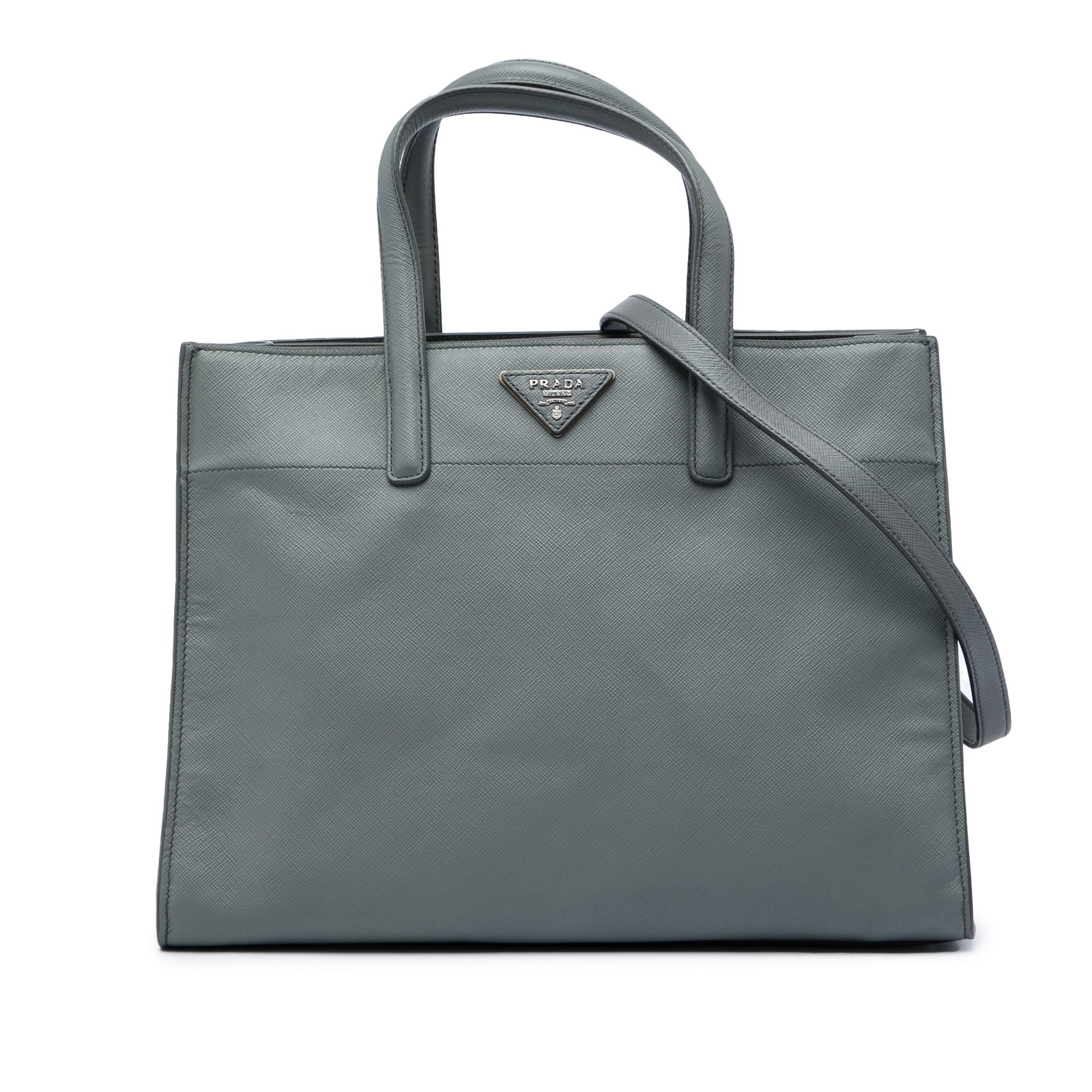 Prada Saffiano Soft Triple Pocket Tote Gray Leather Satchel: Prada Saffiano Soft Triple Pocket Tote Gray Leather Satchel A Prada Saffiano Soft Triple Pocket Tote in gray leather with a structured satchel silhouette. It features flat leather handles, a detachabl