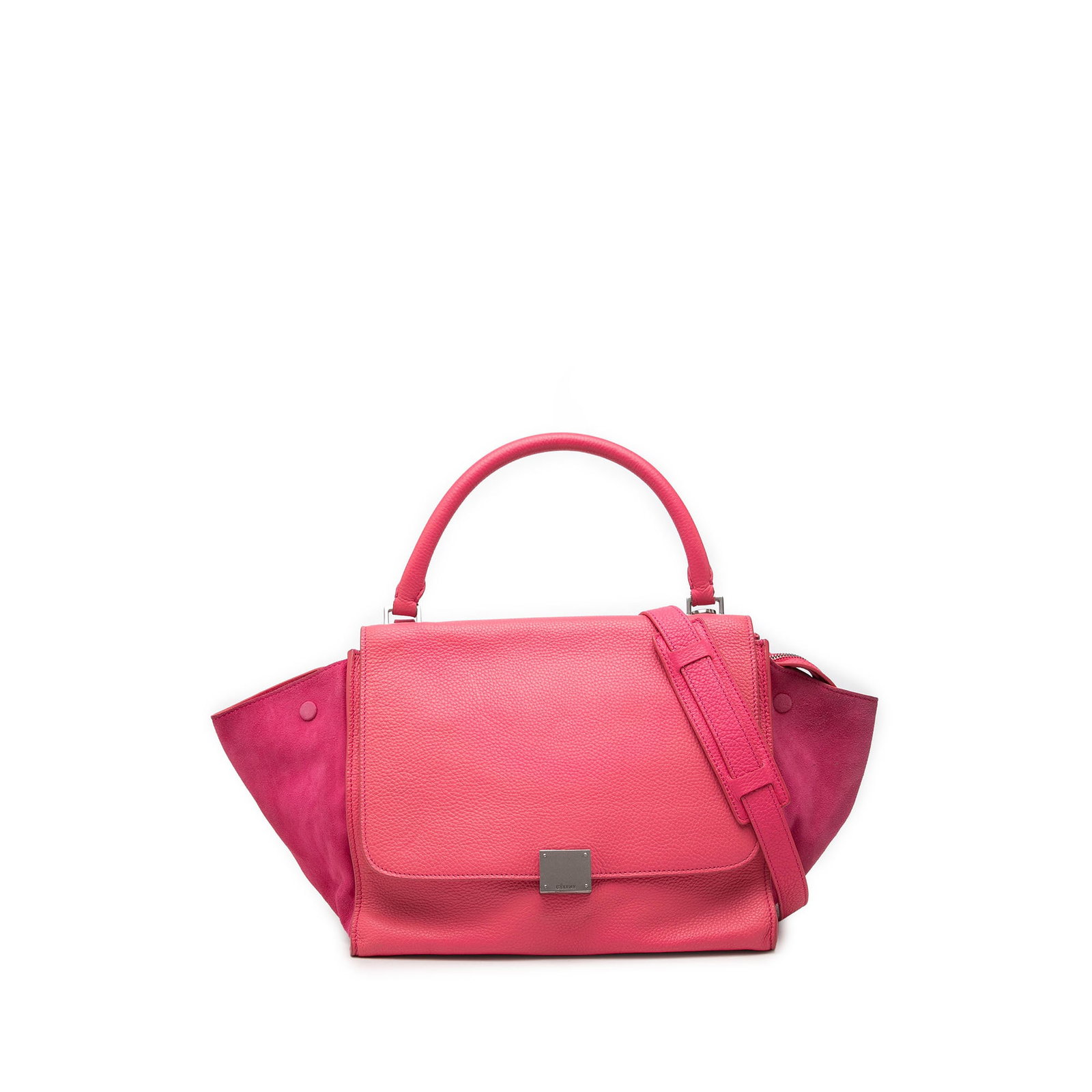 Celine Trapeze Medium Satchel in Calfskin and Suede Pink: Celine Trapeze Medium Satchel in Calfskin and Suede Pink A Celine Medium Trapeze satchel crafted with a leather body and suede side panels. This structured bag features a rolled top handle, a detachab