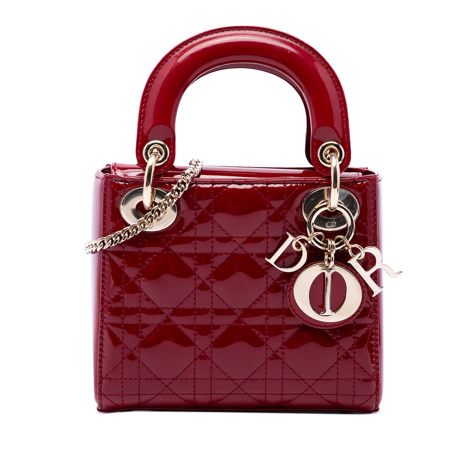 Dior Lady Dior Mini Cannage Patent Leather Bag Red: Dior Lady Dior Mini Cannage Patent Leather Bag Red A Mini Lady Dior bag in red patent leather with the signature Cannage quilted design. It features flat top handles, a detachable flat leather strap, 