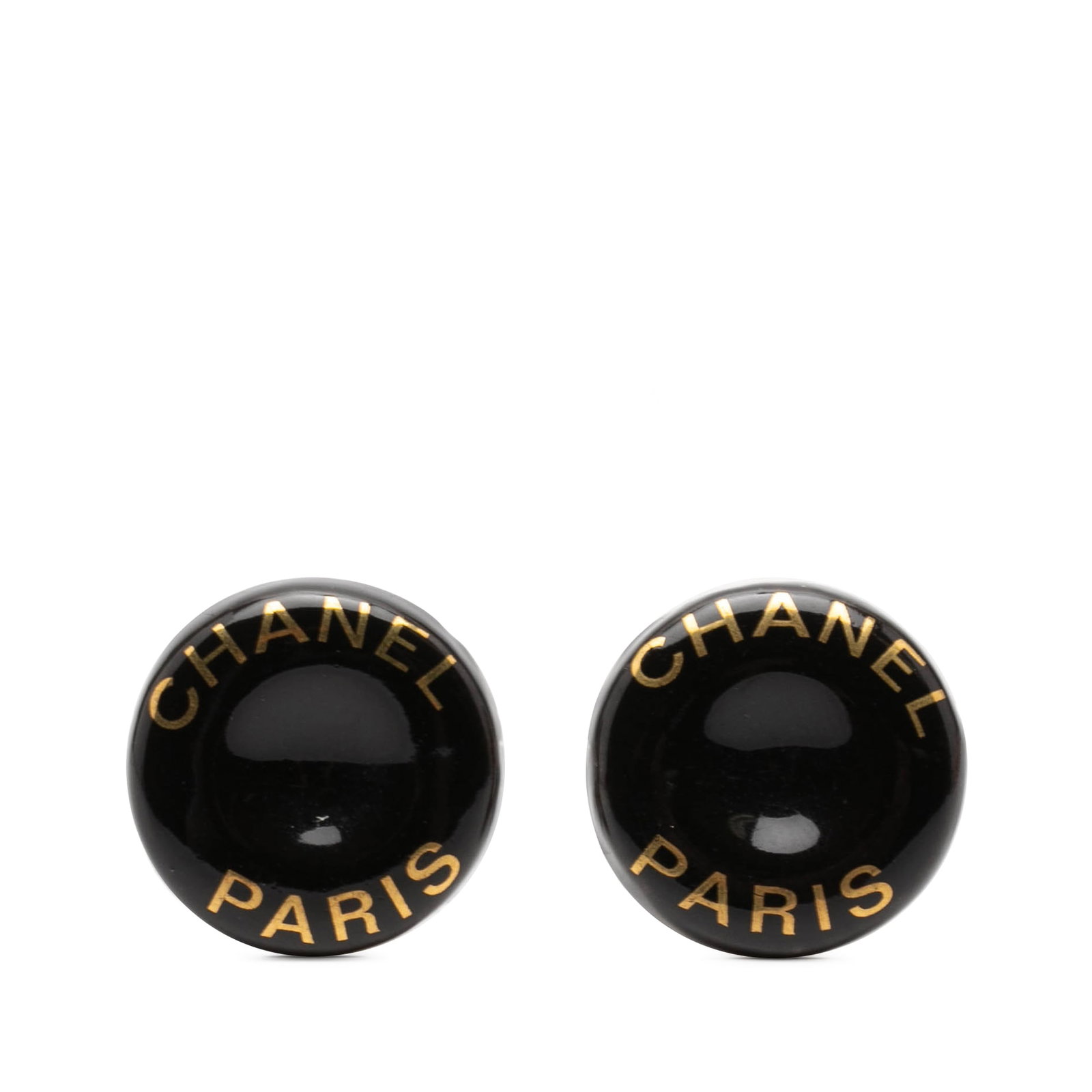 Chanel CC Logo Clip-On Earrings in Black Resin and Brass: Chanel CC Logo Clip-On Earrings in Black Resin and Brass Clip-on earrings featuring Chanel CC logo print styling with resin bodies and gold-tone metal accents. Made in France, this costume jewelry pai