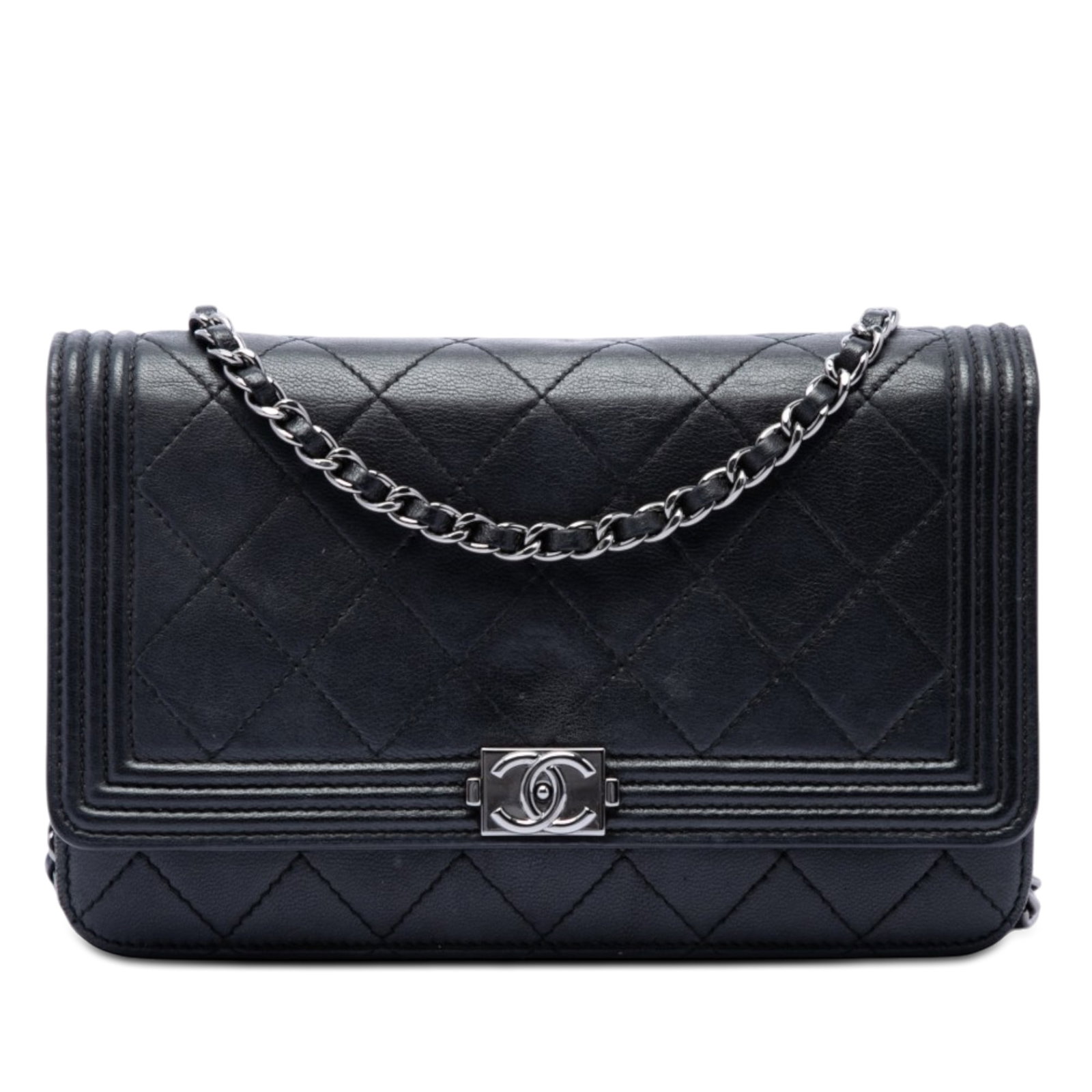 Chanel Boy Wallet On Chain in Black Quilted Lambskin: Chanel Boy Wallet On Chain in Black Quilted Lambskin A Chanel Boy Wallet on Chain crafted in black quilted lambskin leather. This compact crossbody-style bag features a leather-woven chain strap, a fr