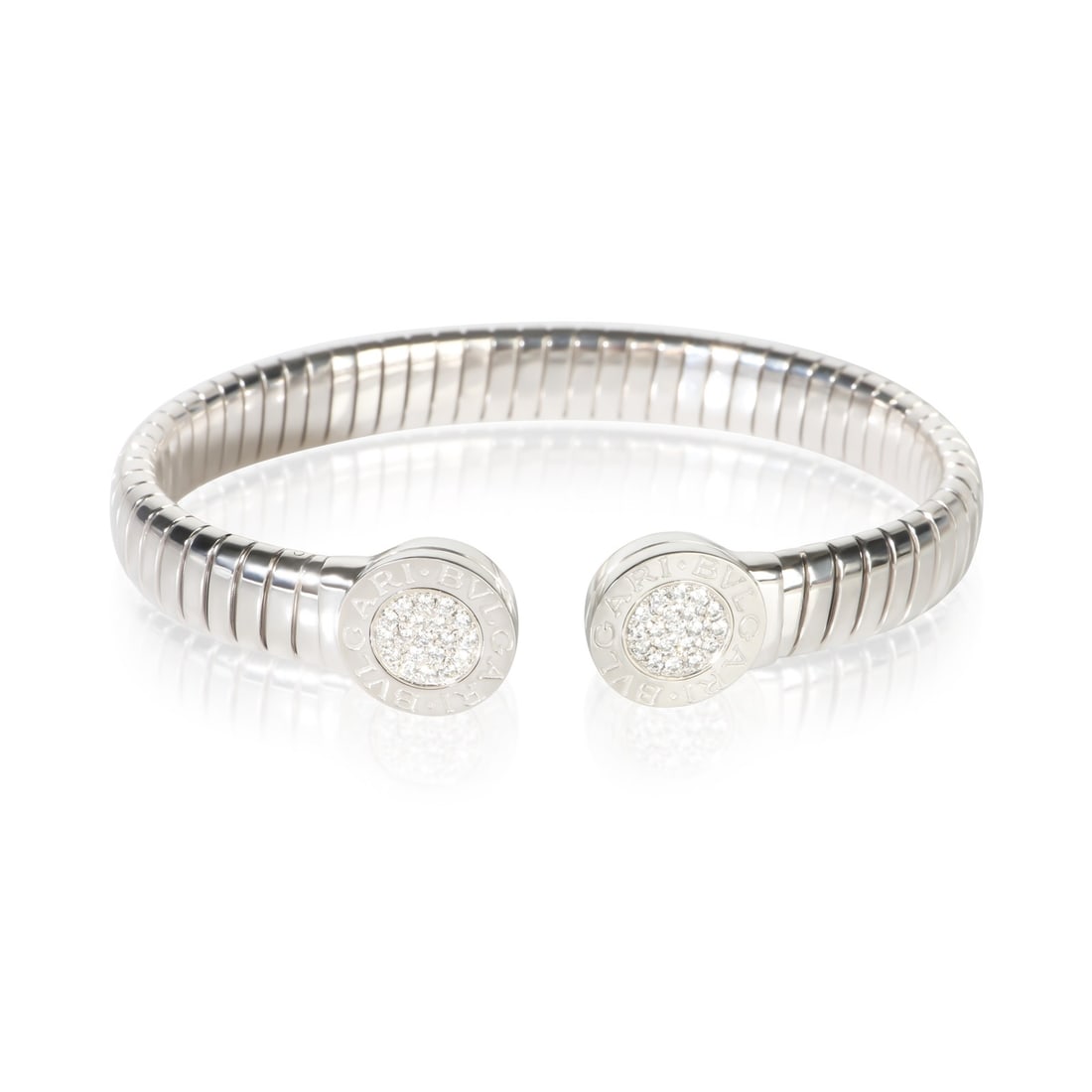 BVLGARI Tubogas Diamond Bracelet in Stainless Steel 6.5 in: BVLGARI Tubogas Diamond Bracelet in Stainless Steel 6.5 in Pre-owned BVLGARI Tubogas bracelet crafted in stainless steel with round brilliant diamonds. This women's bracelet features the signature Tub