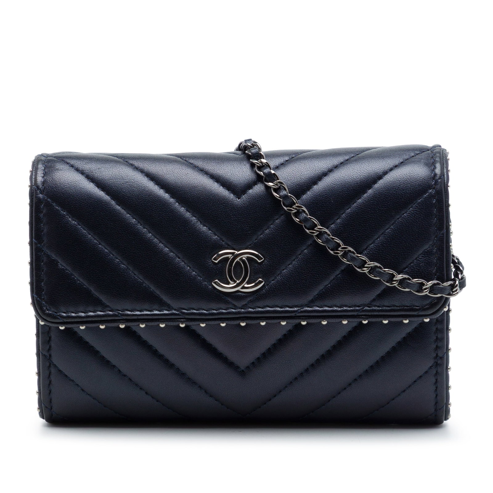 Chanel CC Chevron Studded Lambskin Wallet on Chain Blue: Chanel CC Chevron Studded Lambskin Wallet on Chain Blue Chanel wallet on chain in blue chevron quilted lambskin with studded detailing. This bag features a leather-woven chain link shoulder strap, a f