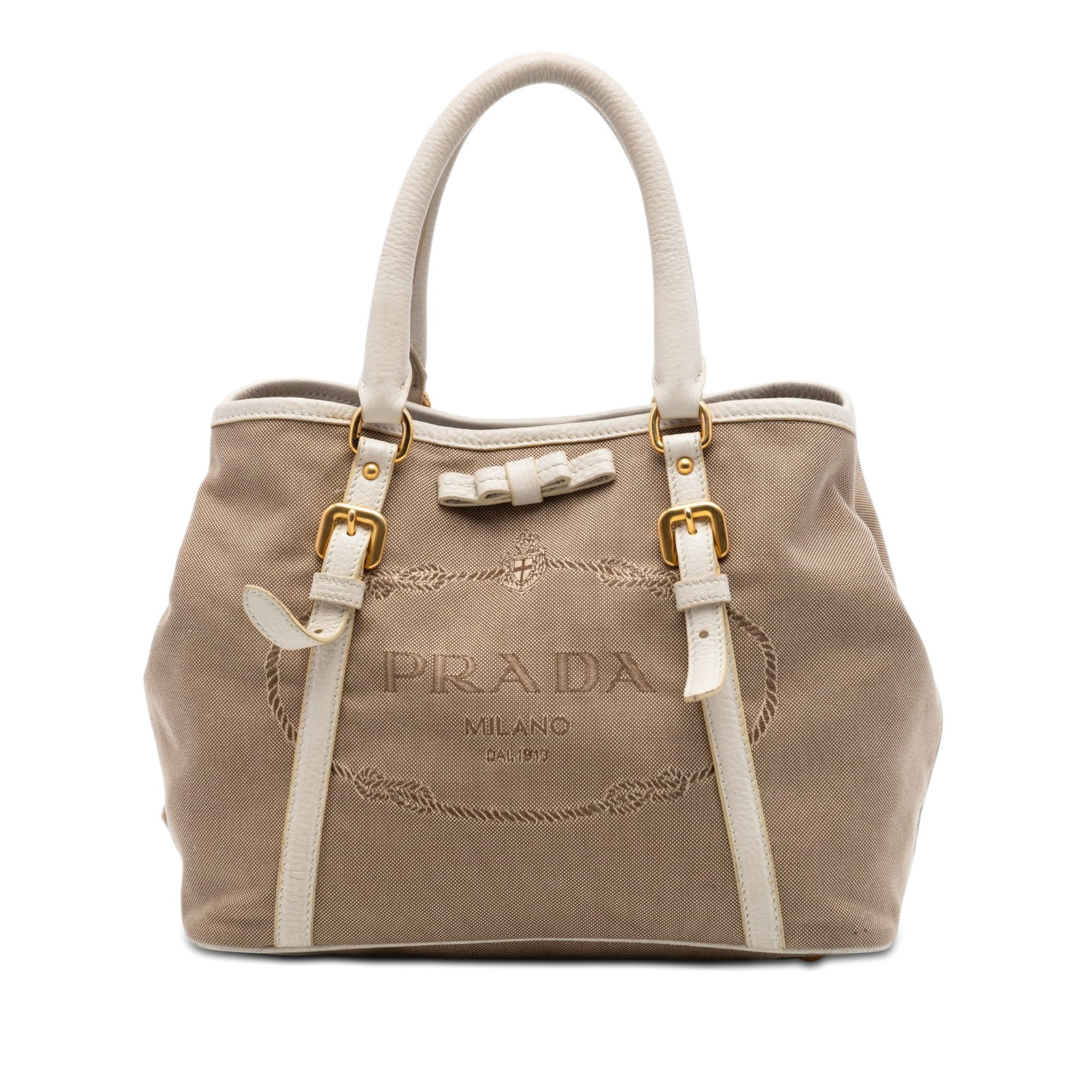 Prada Canapa Bow Logo Canvas Satchel Beige: Prada Canapa Bow Logo Canvas Satchel Beige Prada Canapa Logo Bow satchel in beige canvas with leather trim and rolled leather handles. The bag features an open top with snap closure and an interior wi